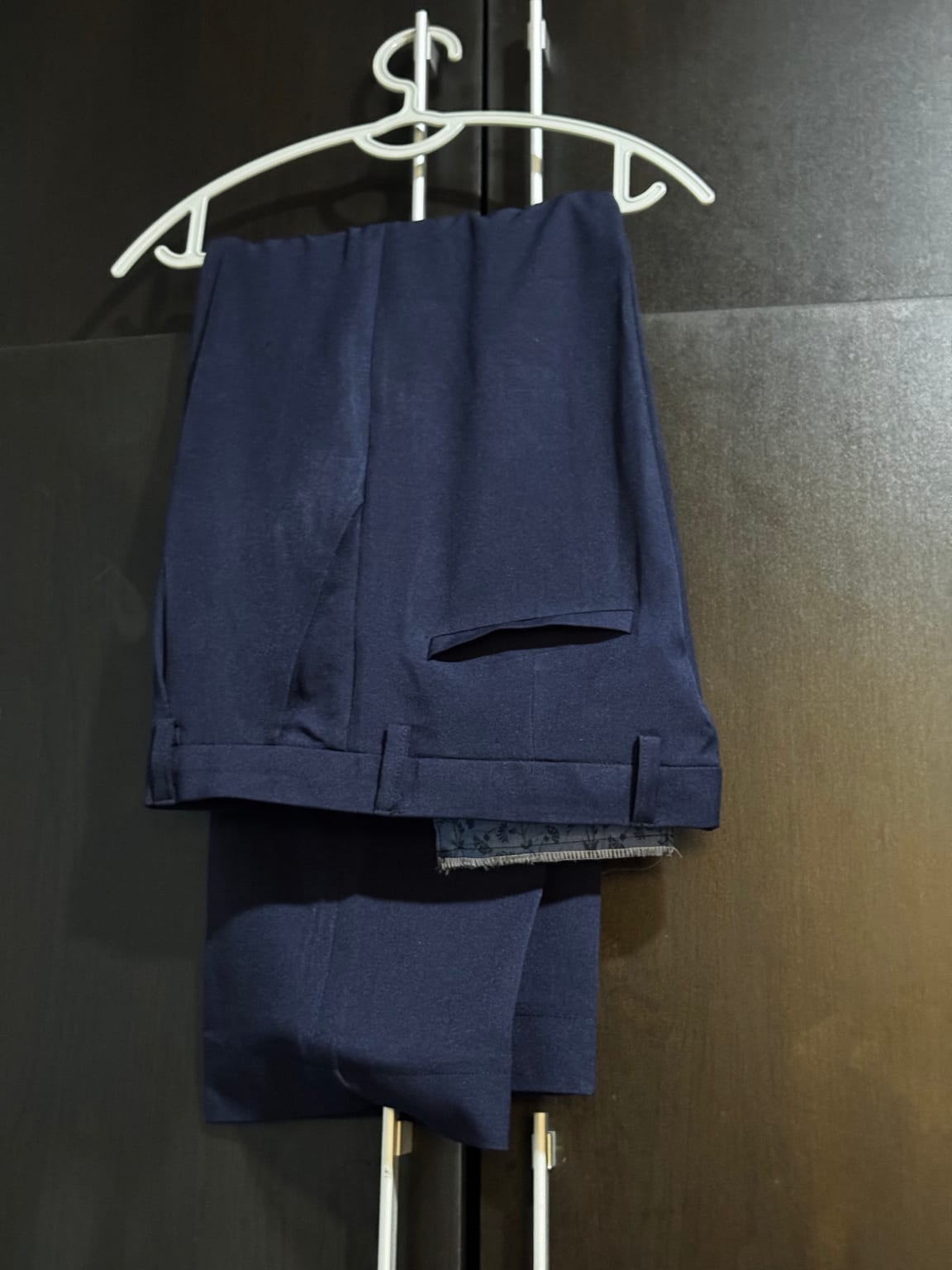 Can be paired with a white shirt and black shoes for a formal look.
