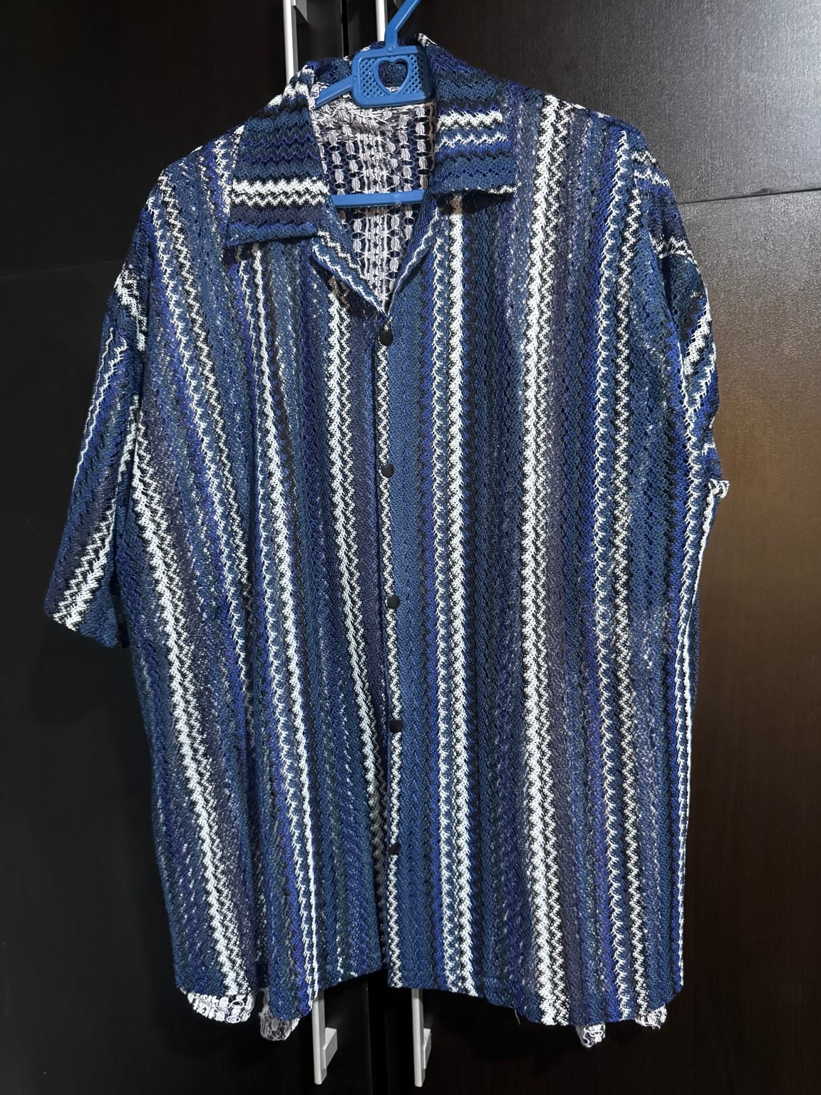 Pair with light jeans or shorts for a relaxed look.